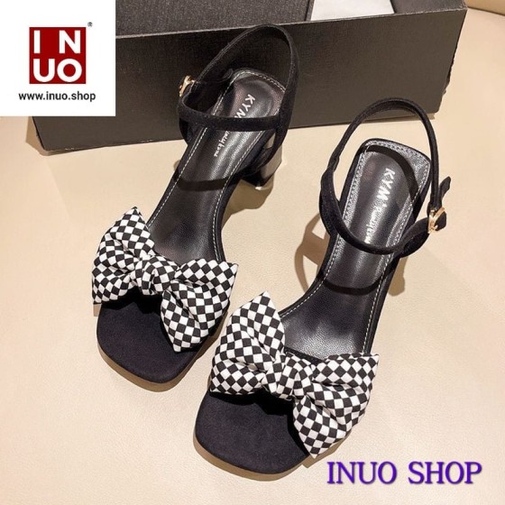 Zapatillas de tacon alto con nudo de moño